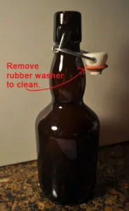 A brown flip-top bottle, with a note to remove the rubber washer to clean it